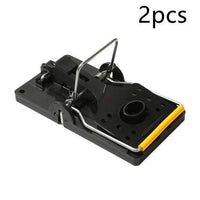 Heavy-duty classic snap mouse trap with wooden base and metal spring for quick rodent control