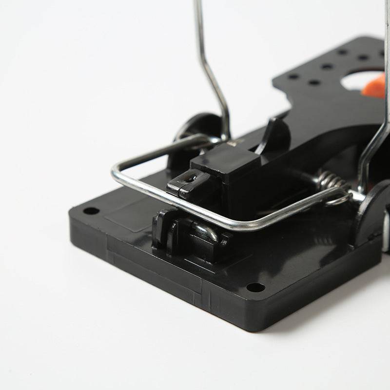 Heavy-duty classic snap mouse trap with wooden base and metal spring for quick rodent control