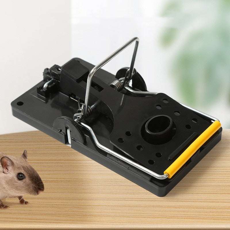 Heavy-duty classic snap mouse trap with wooden base and metal spring for quick rodent control
